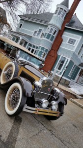 Classic antique car parked outside the Inn