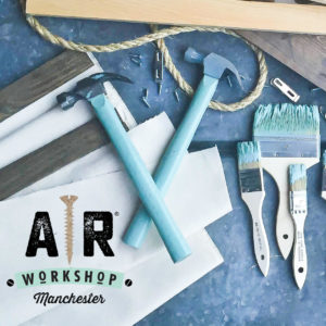 Blue Hammers and paint brushes with AR Workshop logo